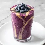 creamy vegan blueberry almond butter smoothie - featured image