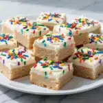 soft frosted sugar cookie bars - featured image